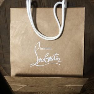Small original authentic CHRISTIAN LOUBOUTIN shopping bag. Approximately 12 X 10